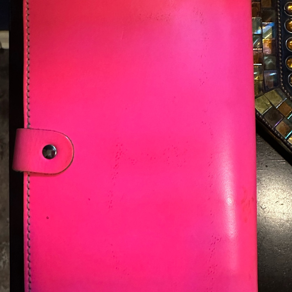 Hot pink Filofax with zipper pockets